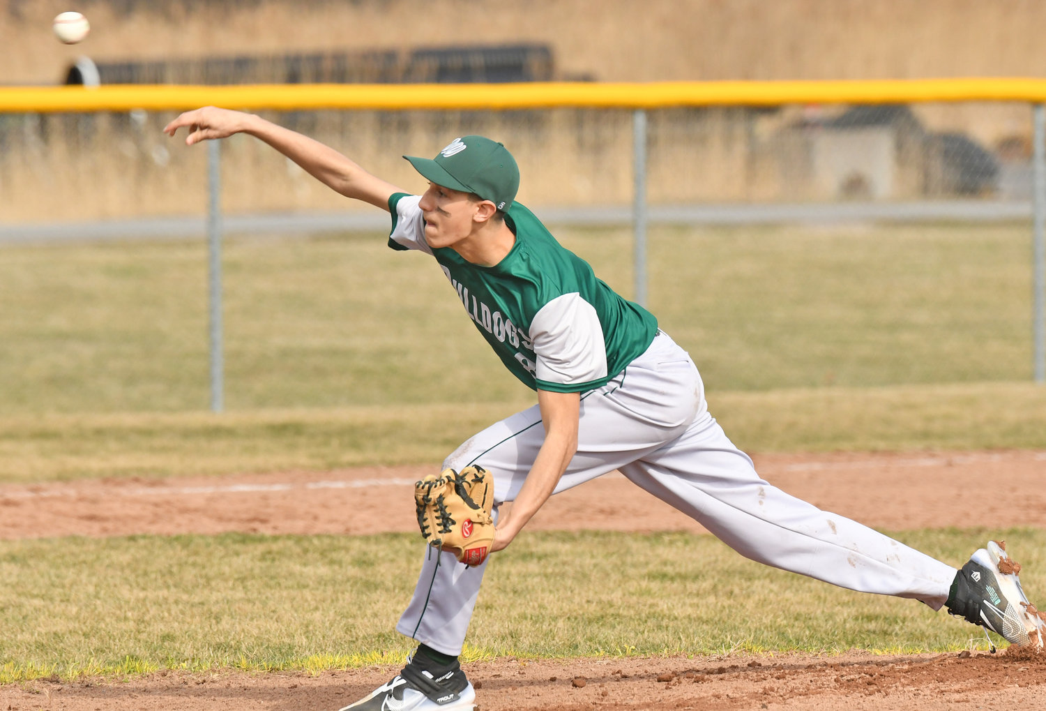 SIX STRONG INNINGS — Westmoreland starting pitcher Hunter Kierpiec delivers against Oriskany Tuesday. He threw six scoreless innings to earn the win as the Bulldogs won 11-2.