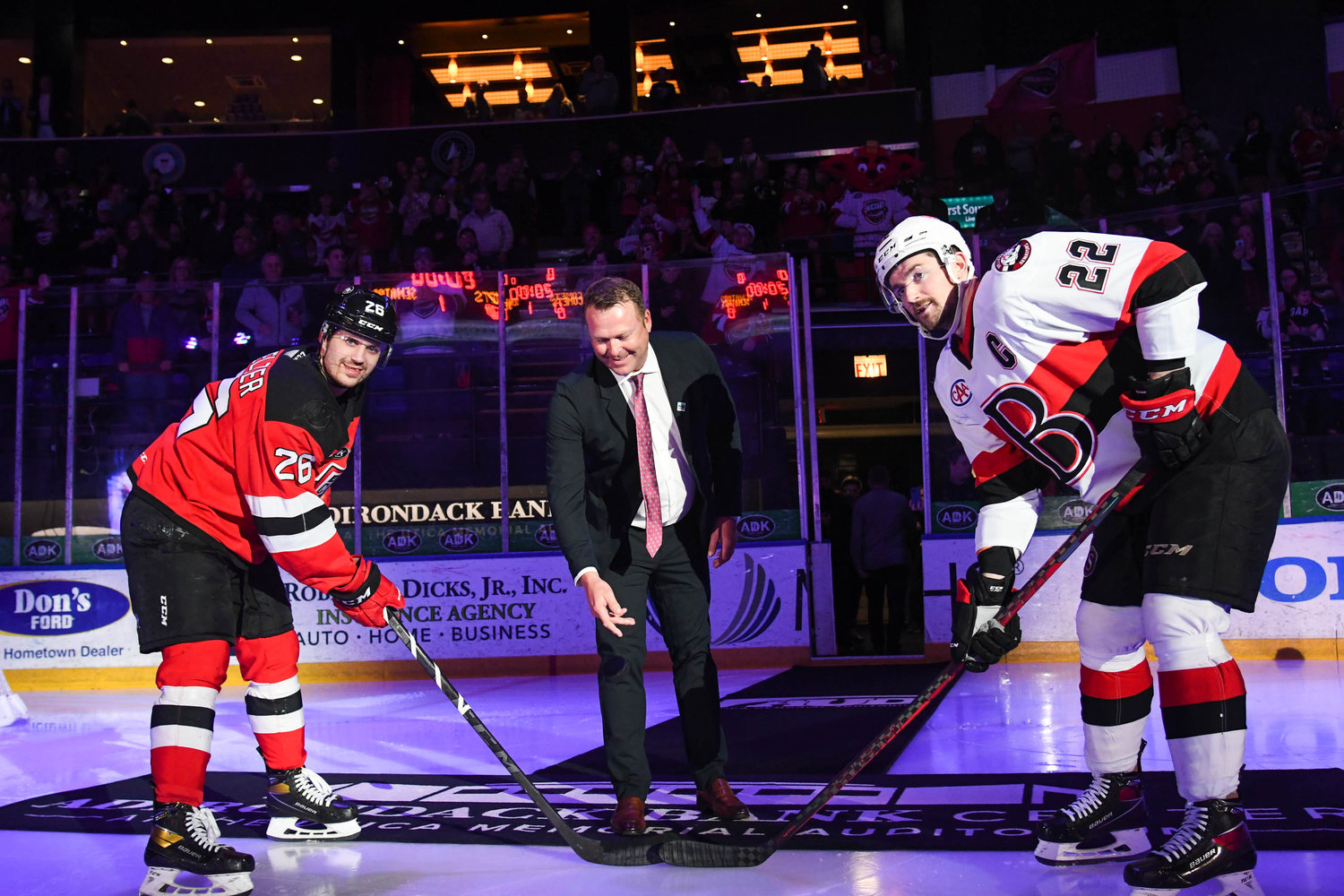 DROP THE PUCK — Hall of Fame goaltender Martin Brodeur drops the puck to start the AHL game between the Utica Comets and the Belleville Senators on Wednesday night in Utica.