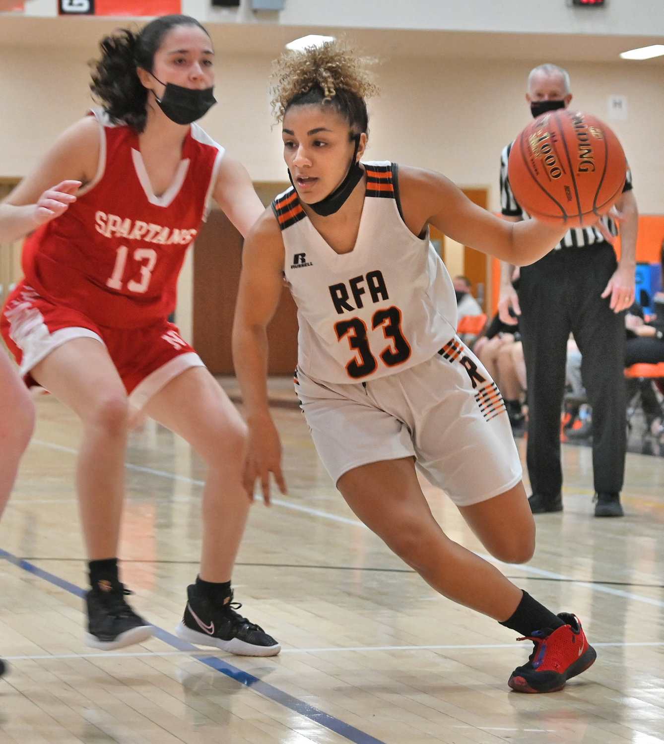 DRIVING TO THE BASKET — Rome Free Academy junior guard Amya McLeod drives to the basket against New Hartford in this file photo. McLeod went from eighth to third on the program’s all-time scoring list this season.