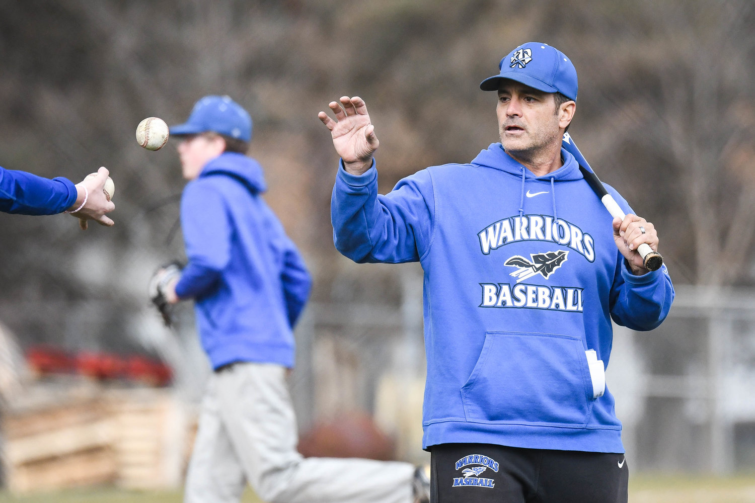 PREPARING THE TEAM — Whitesboro head coach Tom Maggiolino hits fly balls for his players during practice on Tuesday.