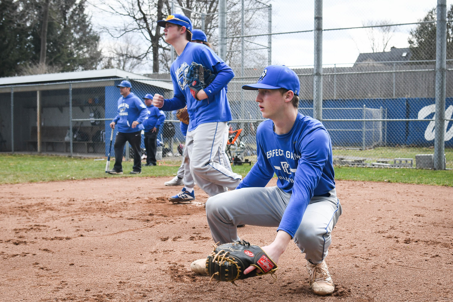 LOOKING OUT — Whitesboro players run pitcher and catcher fielding drills during practice on Tuesday. The goal remains a deep run into June for Whitesboro.