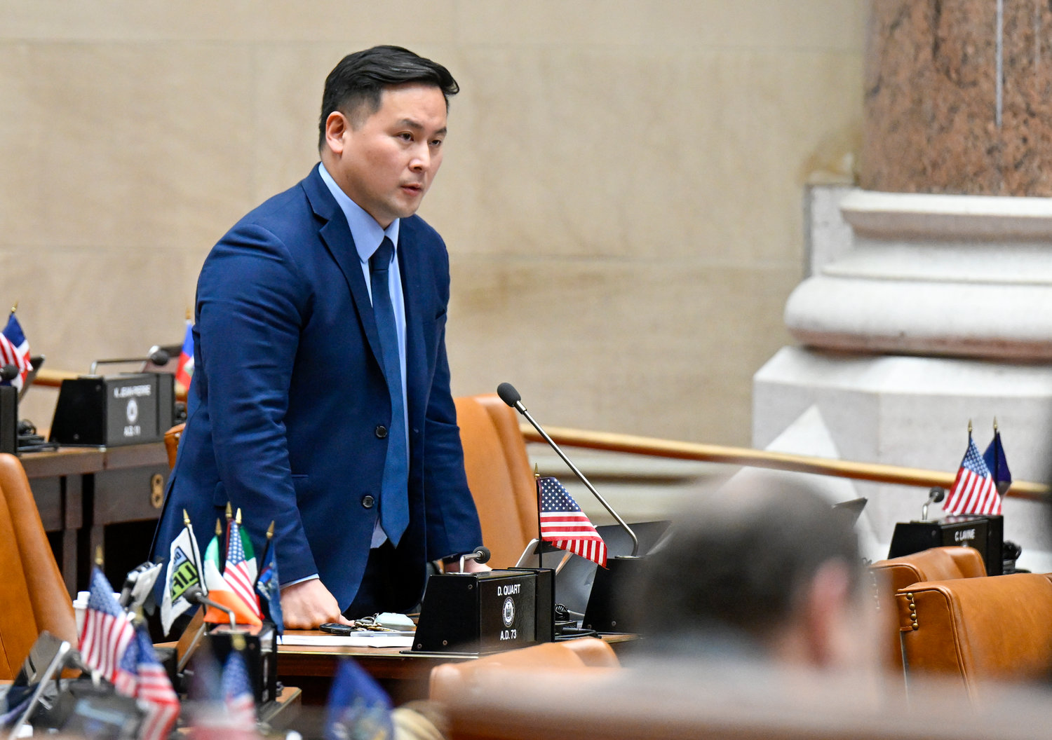 Assemblyman Ron Kim, D-Flushing, debates budget bills during a legislative session in the Assembly Chamber at the state Capitol, Friday, April 8, 2022, in Albany, N.Y. (AP Photo/Hans Pennink)