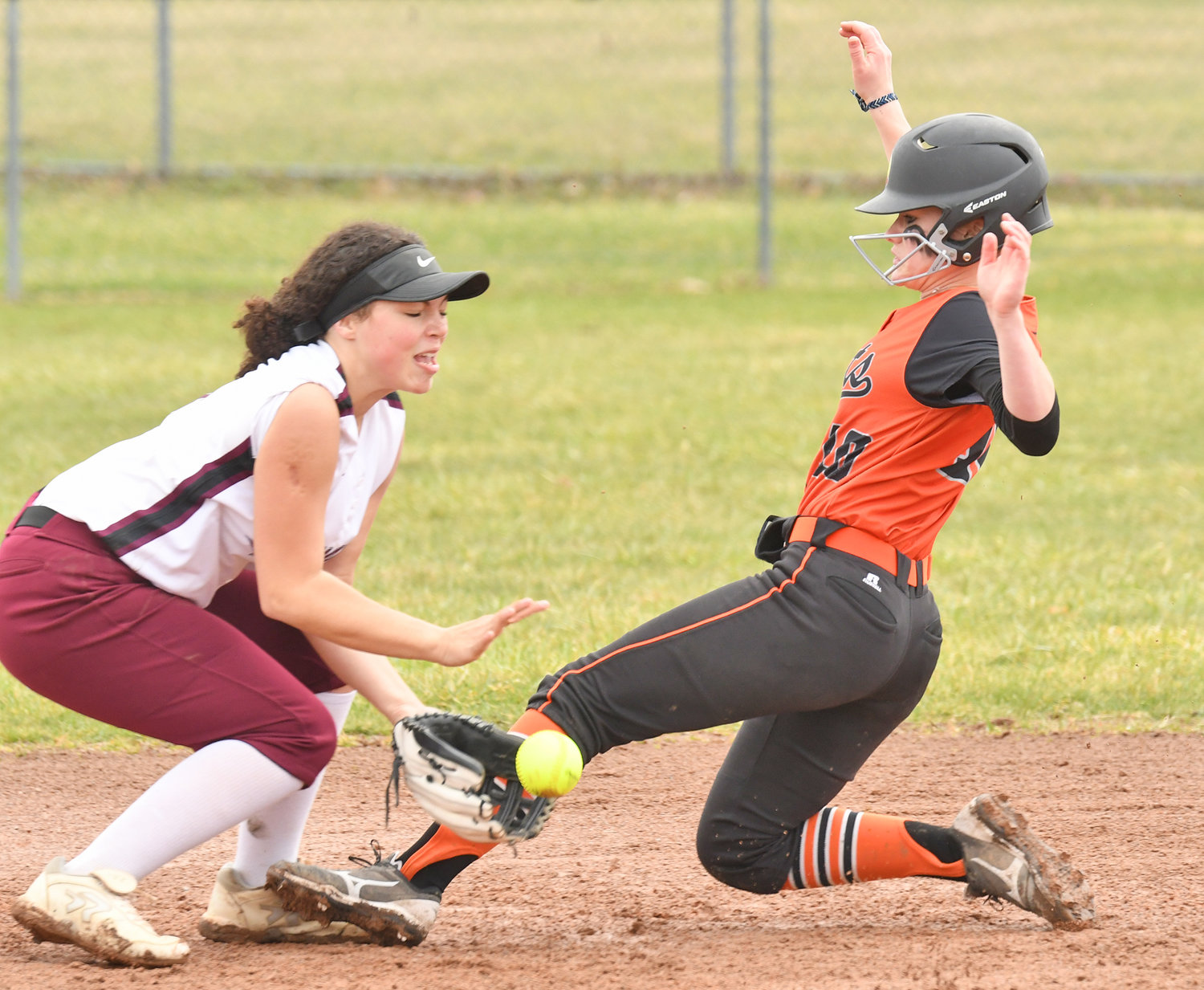 SAFE AT SECOND — Rome Free Academy senior Maggie Closinski slides in to second with Central Square shortstop Carley Cinquemani taking the throw. Closinski was safe on the play and would score later in the first inning of the Black Knights’ 8-0 win to open the season at home at Kost Field.