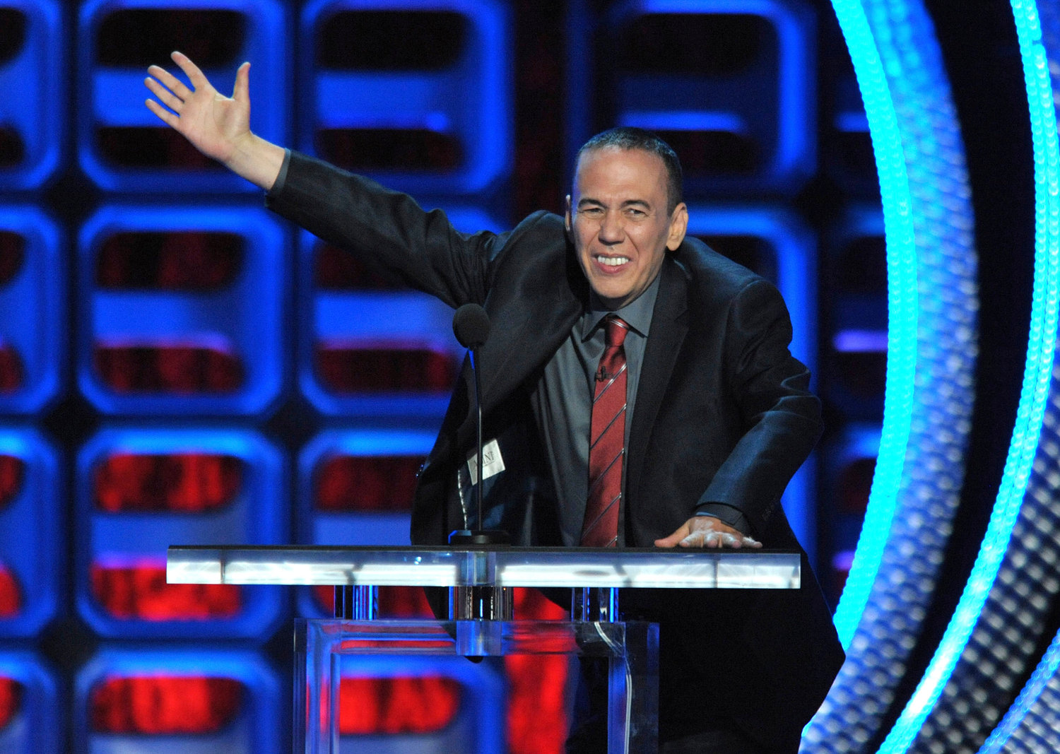 FILE - Gilbert Gottfried performs at the Comedy Central “Roast of Roseanne” in Los Angeles on Aug. 4, 2012. Gottfried‚Äôs publicist and longtime friend Glenn Schwartz said Gottfried, an actor and legendary standup comic known for his abrasive voice and crude jokes, died Tuesday, April 12, 2022. He was 67. (Photo by John Shearer/Invision/AP, File)
