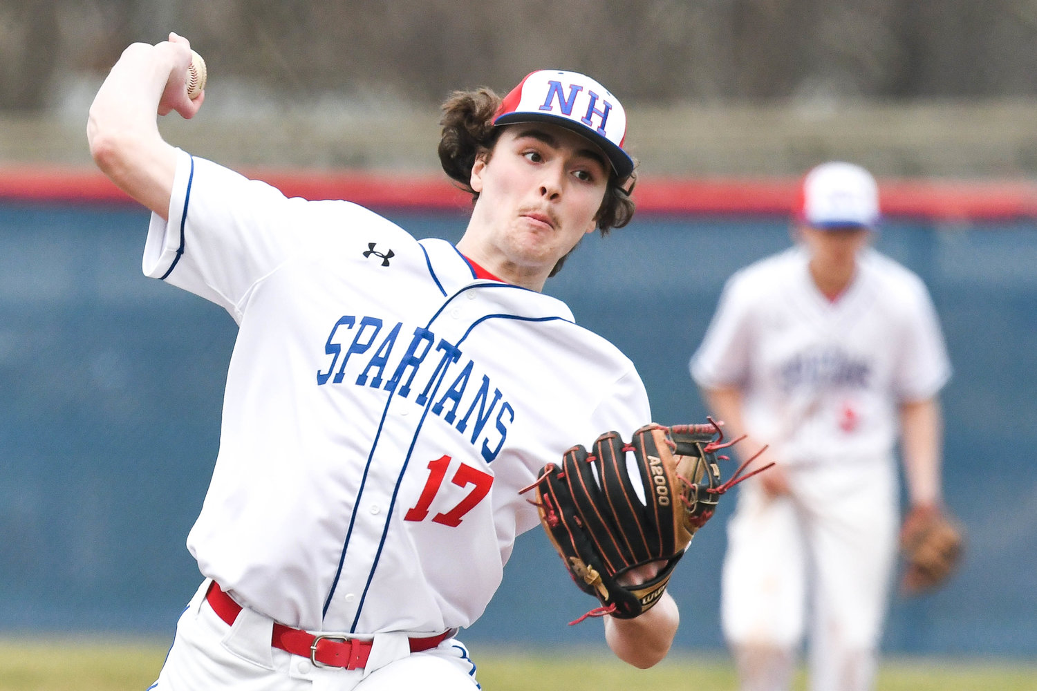 ACE PERFORMANCE — New Hartford pitcher Zach Philipkoski delivers a pitch during the game against Holland Patent on Monday. The junior got the win on the mound as the Spartans won 10-1. He allowed two hits and one run while striking out four in five innings.