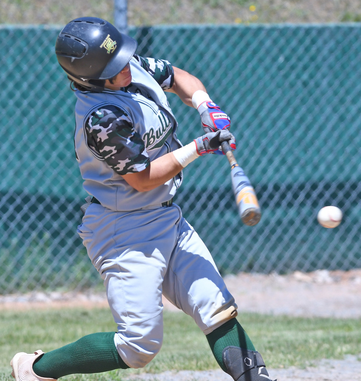 A BIG HIT — Westmoreland’s Caleb Miller gets a hit in this file photo from the 2021 season. Now a senior, Miller is off to a hot start and has big goals for himself and the team.