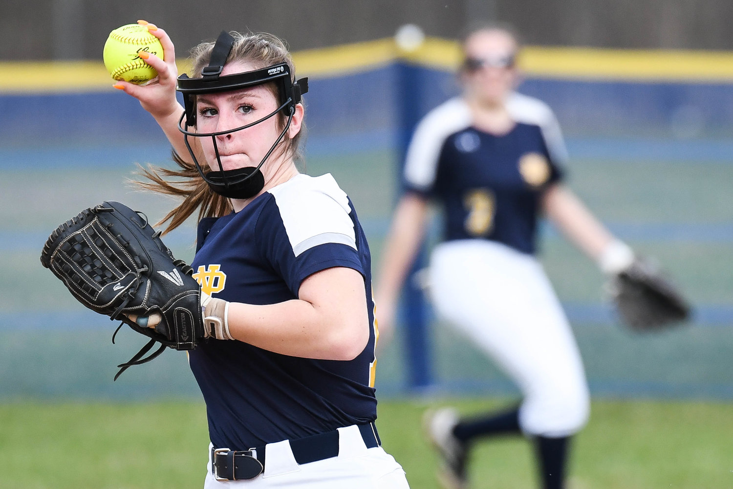 ACROSS THE DIAMOND — Notre Dame's Sam Paparella sets herself for a throw to first base during the game against Oneida on Wednesday. The Jugglers lost 5-1.