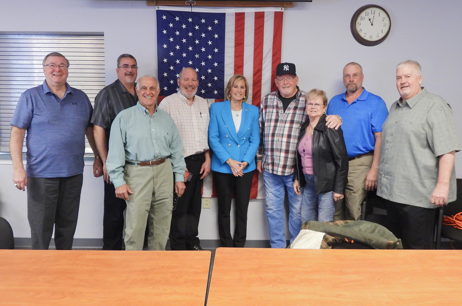 Congresswoman Claudia Tenney stands with Vernon town officials and local residents, congratulating Vernon on receiving $3 million from the federal government to fund a much needed water project