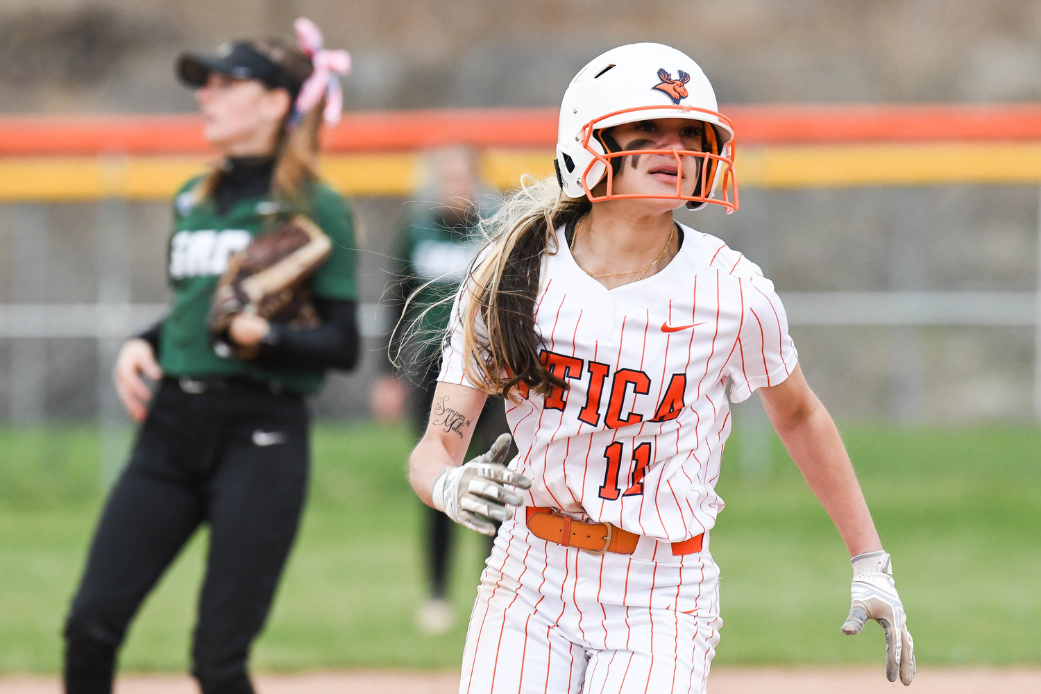 ROUNDING SECOND — Utica University player Abriana Wadley (11) rounds second base during game two of a doubleheader against Russell Sage on Friday at Greenman Softball Field.