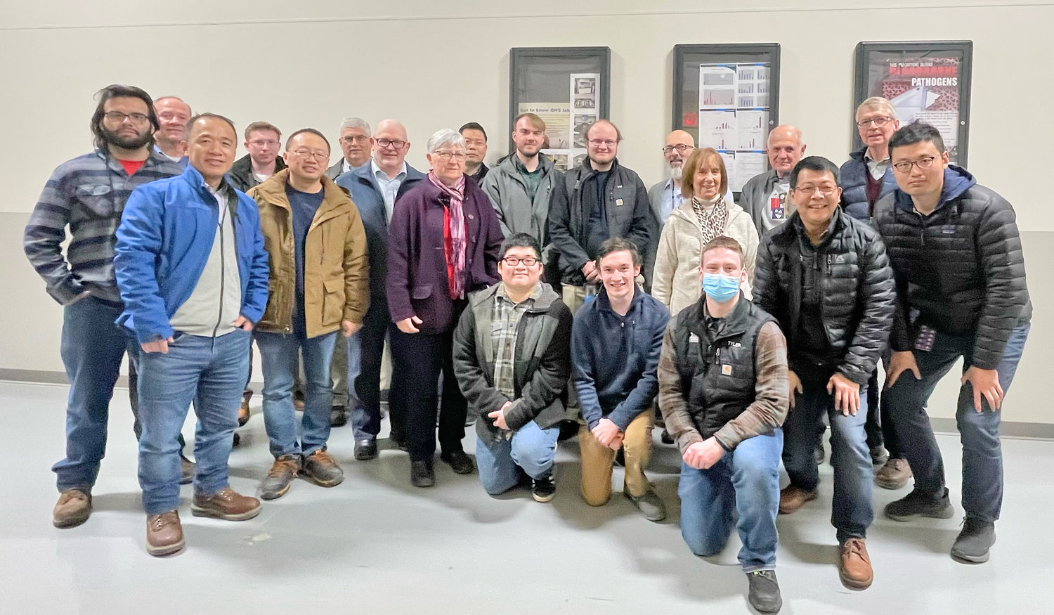 GROUP PHOTO — Members of the Mohawk Valley Chapter of ASM International and their guests recently toured the JH Rhodes factory, a subsidiary of Universal Photonics, Inc., in Vernon.