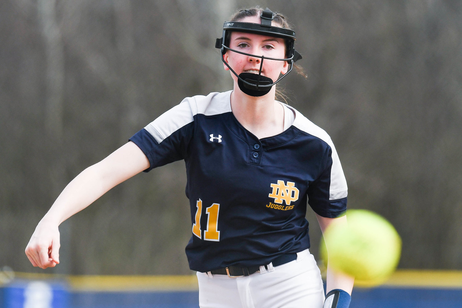 AND THE PITCH — Utica-Notre Dame’s Ella Trinkaus is one of the team’s top pitchers as an eighth-grader this season.