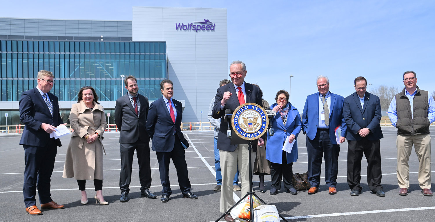 COMPUTER CHIPS AHOY — U.S. Sen, Charles E. Schumer speaks as a group of local officials and business leaders stand in the background, at the future Wolfspeed chip fabrication facility in Marcy on Monday. Schumer was in town to tout the Mohawk Valley as a potential leader in the industry and urge additional investment in the region by the industry.