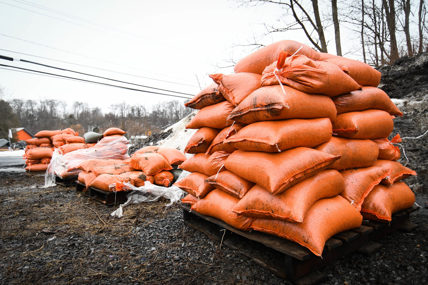 FAMILIAR SIGHT — In this Daily Sentinel file photo, piles of free sandbags were available for Whitesboro residents to pick up at the village Department of Public Works on Main Street as a precautionary measure to help residents feel safer about potential flooding at their homes.