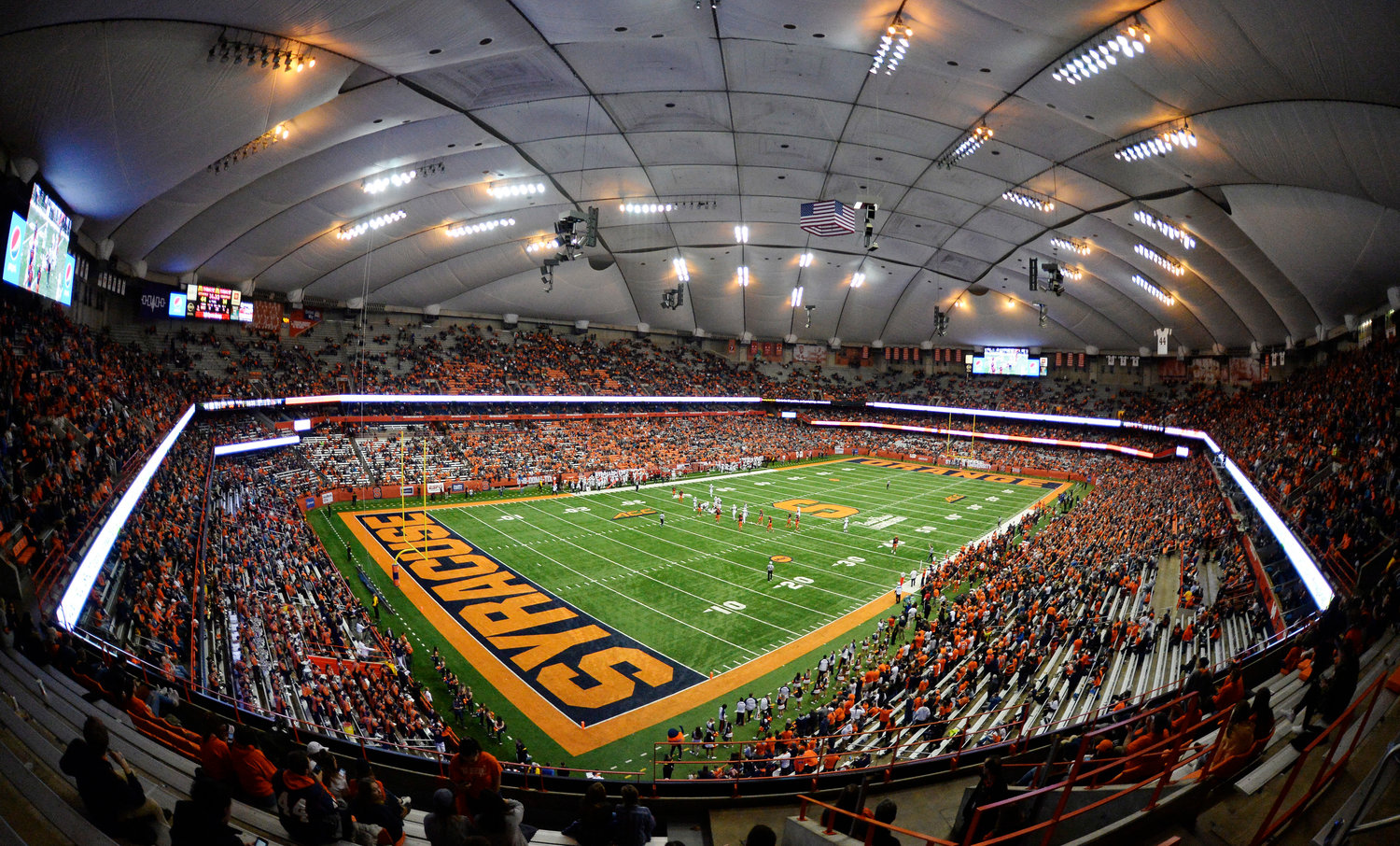Syracuse and Louisville play a college football game at the Carrier Dome in Syracuse, Nov. 9, 2018. The Carrier Dome is getting a new name. The university and Carrier Global Corporation have agreed to a deal that ends the company's hold on naming rights to the on-campus venue that's home to the Syracuse basketball, football, and lacrosse teams, effective May 1.