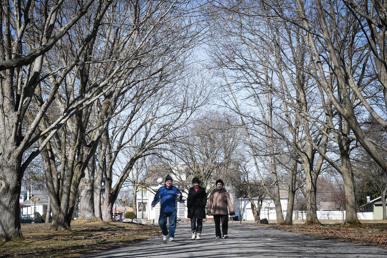 NICE DAY FOR A WALK — Park goers go for a walk on a sunny day at F.T. Proctor Park in Utica earlier this spring.  The Central New York Conservancy, which advocates on behalf of the city’s Olmstead parks including F.T. Proctor Park, has appointed a new executive director.
