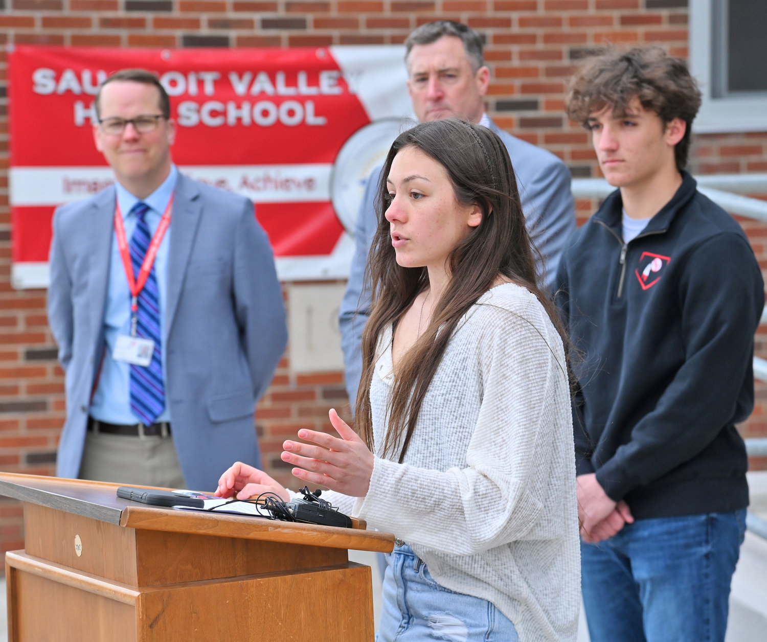 POWERFUL VOICES — Student council president Alena Weibel talks about the importance of staying safe during prom season at Sauquoit Valley High School on Friday, kicking off the No Empty Chair campaign for next week. Weibel was joined by, from left, Principal Brian Read, Superintendent Ronald Wheelock and senior class president Benjamin LoGalbo.