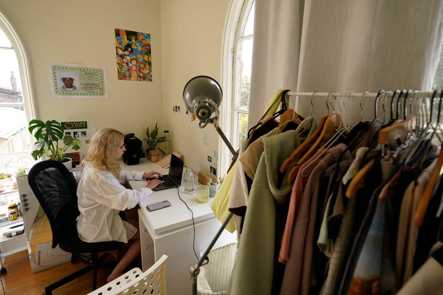 NOT MUCH ROOM — University of California, Berkeley junior Sofia Howard-Jimenez studies at a desk in her converted dining room bedroom of the apartment she shares with three others in Berkeley, Calif., Tuesday.