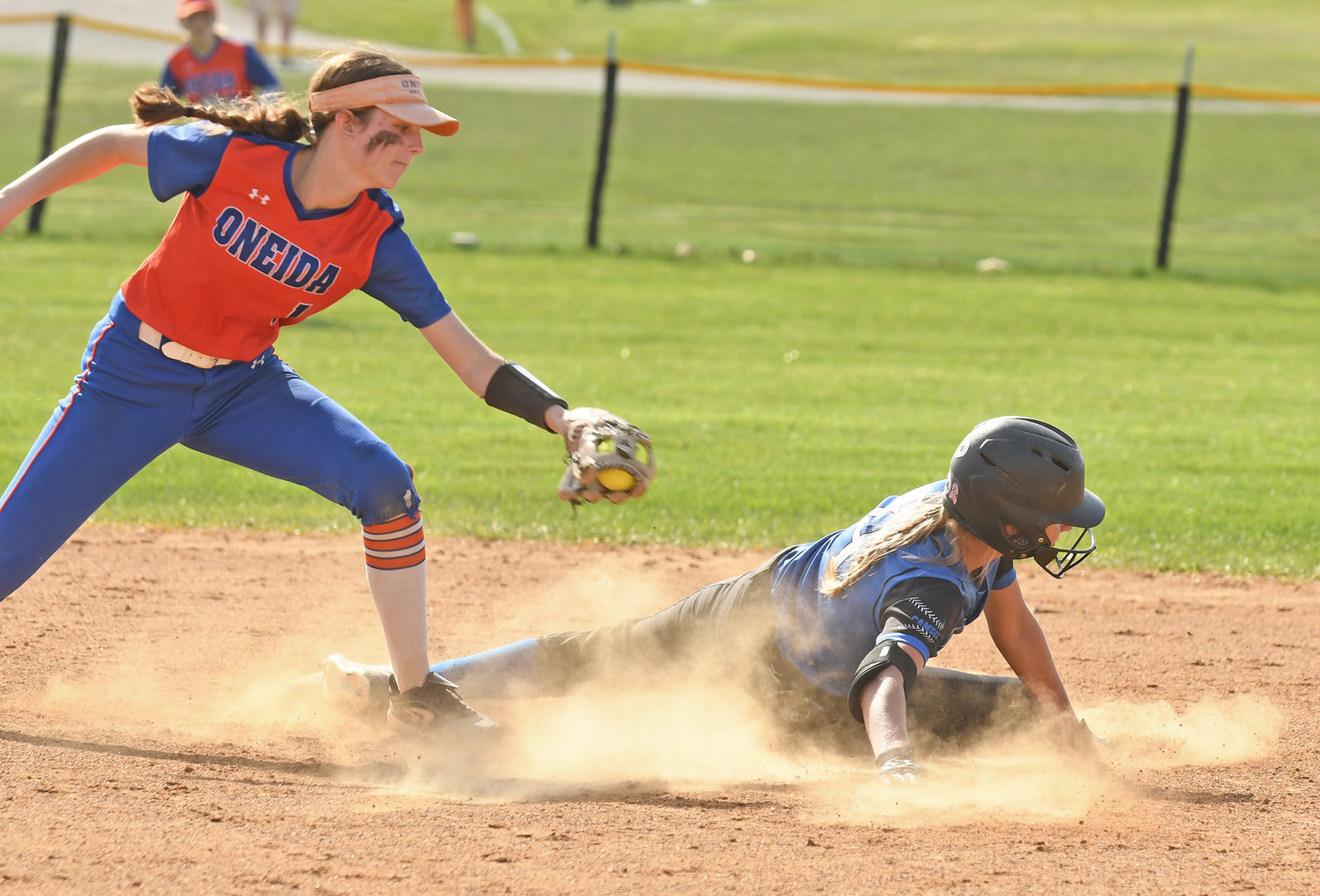 SAFE AT SECOND — Oneida shortstop Kaylin Curro reaches out but can’t quite get the tag on Camden baserunner Jadyn Prievo in the Tri-Valley League matchup at Oneida Monday. The Blue Devils won 9-6.