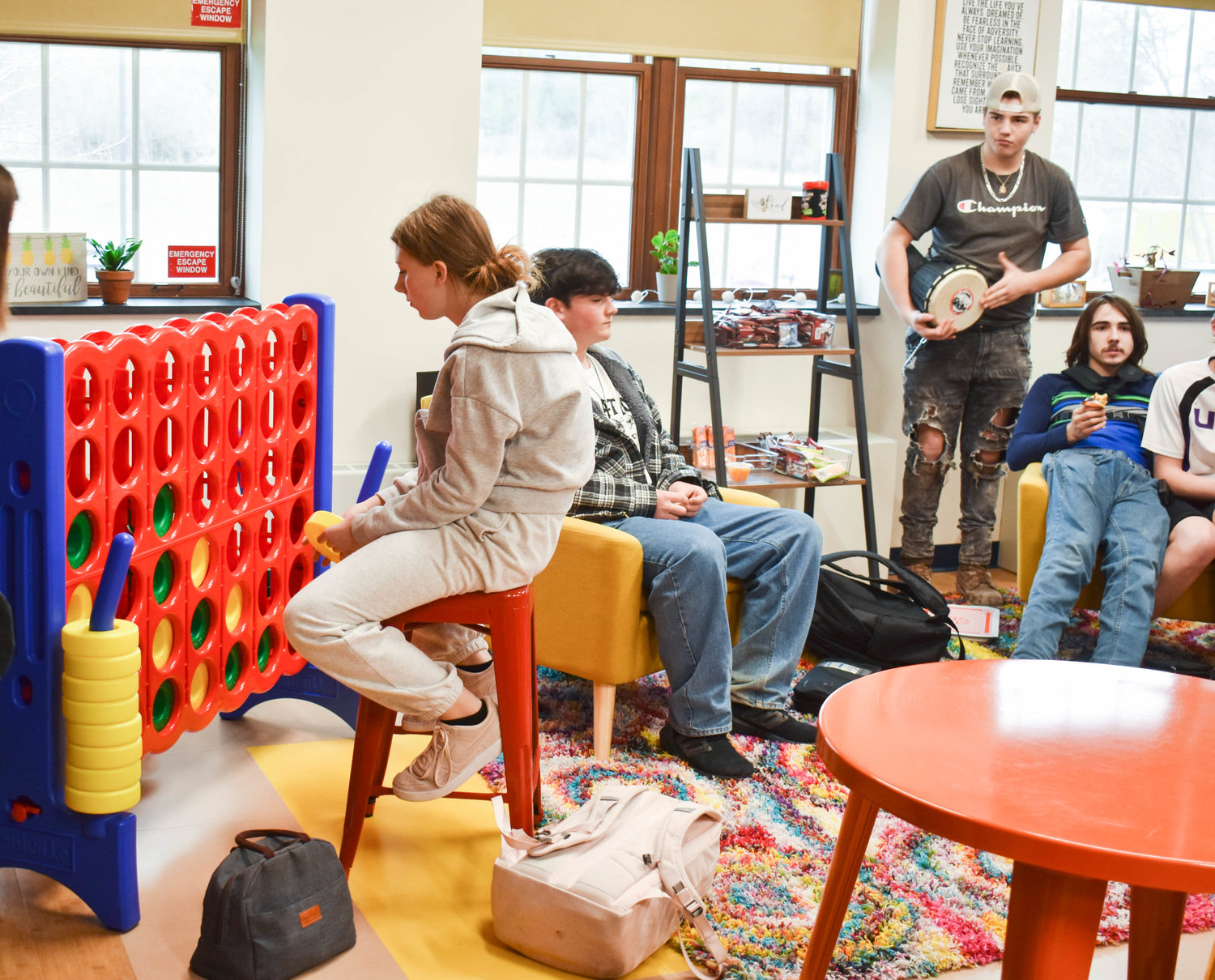 HUB — Students hang out in the CCS Hub where, according to program and district officials, students can play games, snacks, and more are available to all students.