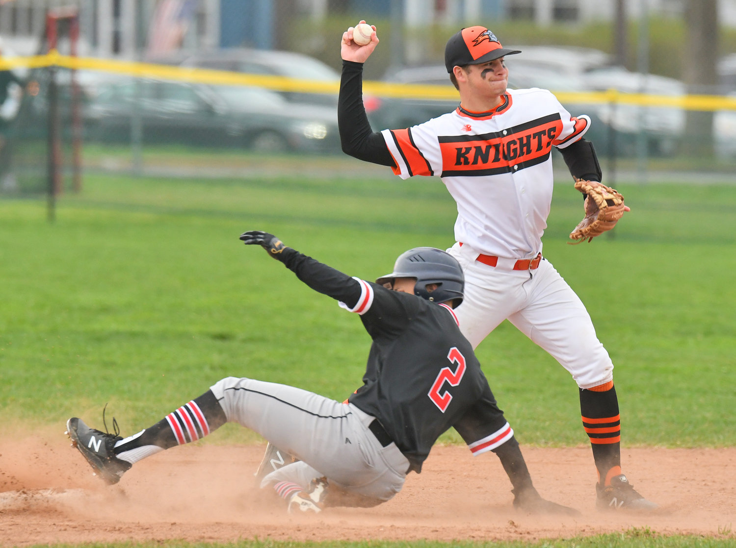 TRYING FOR TWO — RFA's Tanner Brawdy tries to turn a double play with the out of Proctor's Martin Learnard at second in Rome. RFA couldn't complete the double play. Proctor won 11-4 in six innings.
