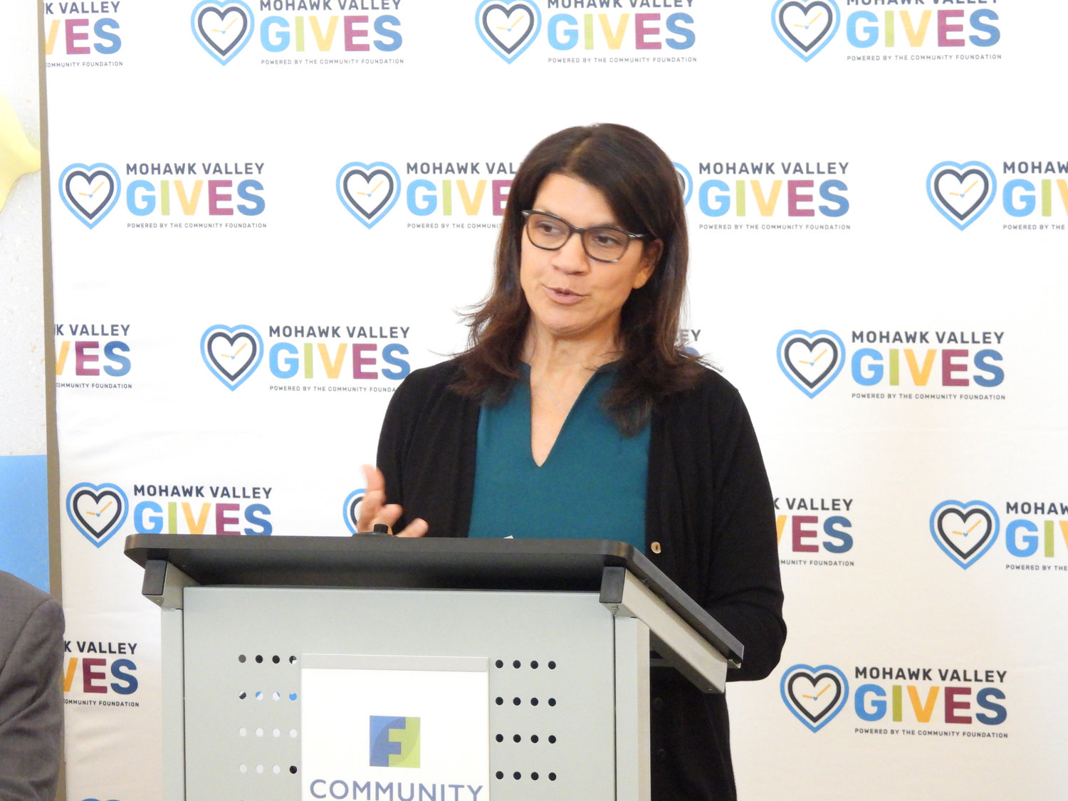 BUILDING COMMUNITY GENEROSITY — Alicia Fernandez Dicks, president/CEO of the Community Foundation, explains the initiative to help local nonprofits at a press conference on Wednesday.