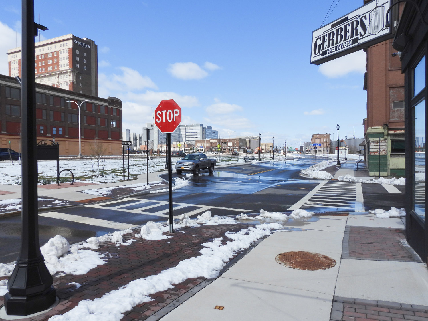 WALKABLE UTICA — Mark Mojave, owner of Gerber's 1933 Tavern, speaks highly of the walkable sidewalks and paths through Bagg's Square that came with the highway project, seeing them as a giant step forward for people to safely enjoy what Utica has to offer.