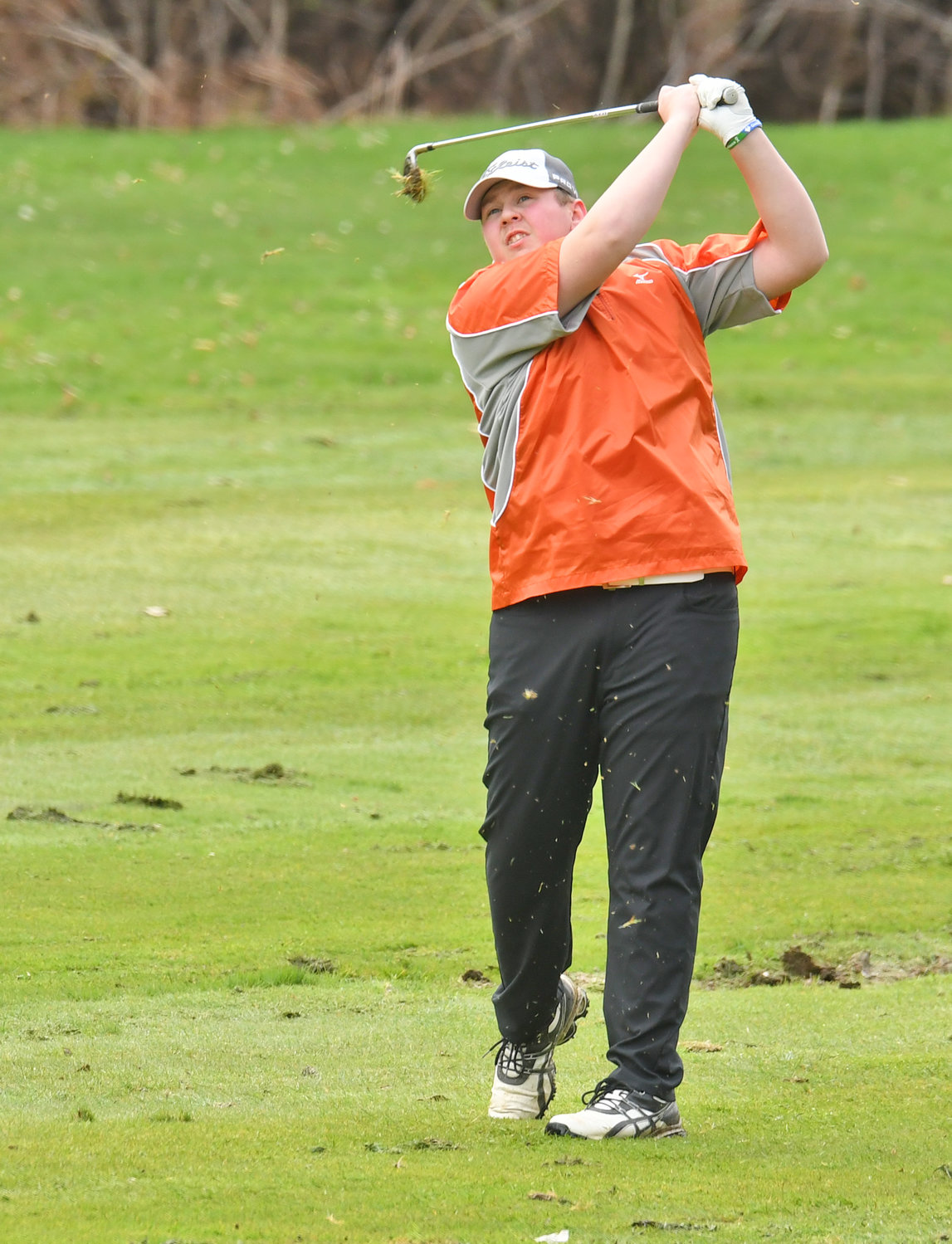 FIRE AWAY — Rome Free Academy golfer Michael Occhipinti hits an iron to the 11th green in the Black Knights' match against Whitesboro Wednesday afternoon at Rome Country Club. Occhipinti shot a team-best 48 but the Knights lost 229-280.
