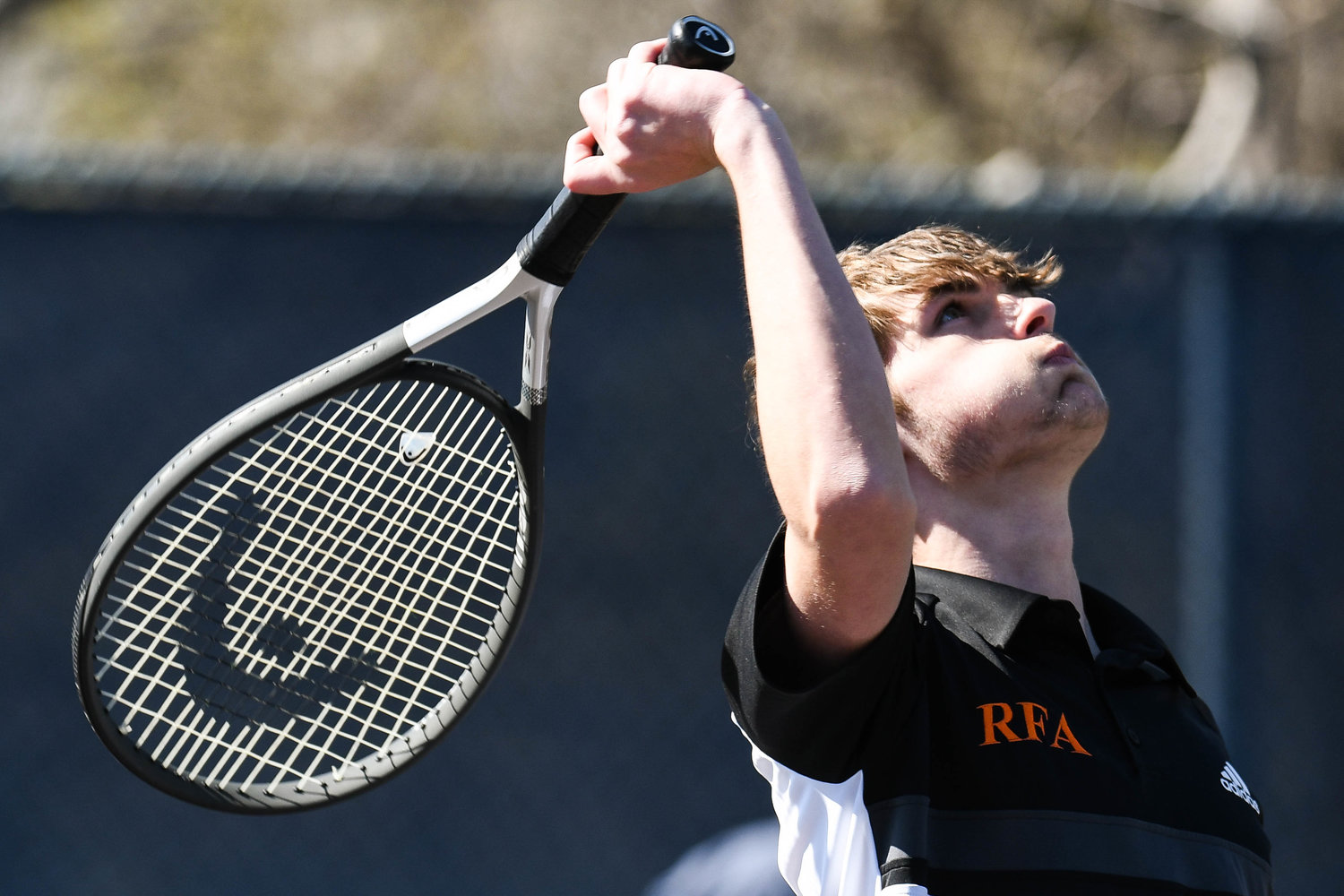 LOOKING FOR AN ACE — Rome Free Academy’s Gavin Civitelli serves the ball during a tennis match against Central Valley Academy on Thursday. Civitelli won in second singles and the Black Knights won 5-0 on the road in the Tri-Valley League.
