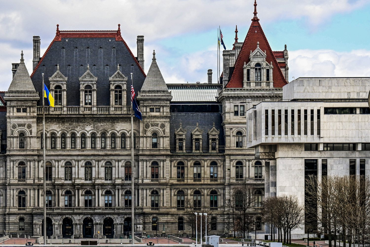 Partial views of the New York state Capitol building, left, is shown next to the state Appellate court building in foreground, right, are shown earlier this month in Albany.
