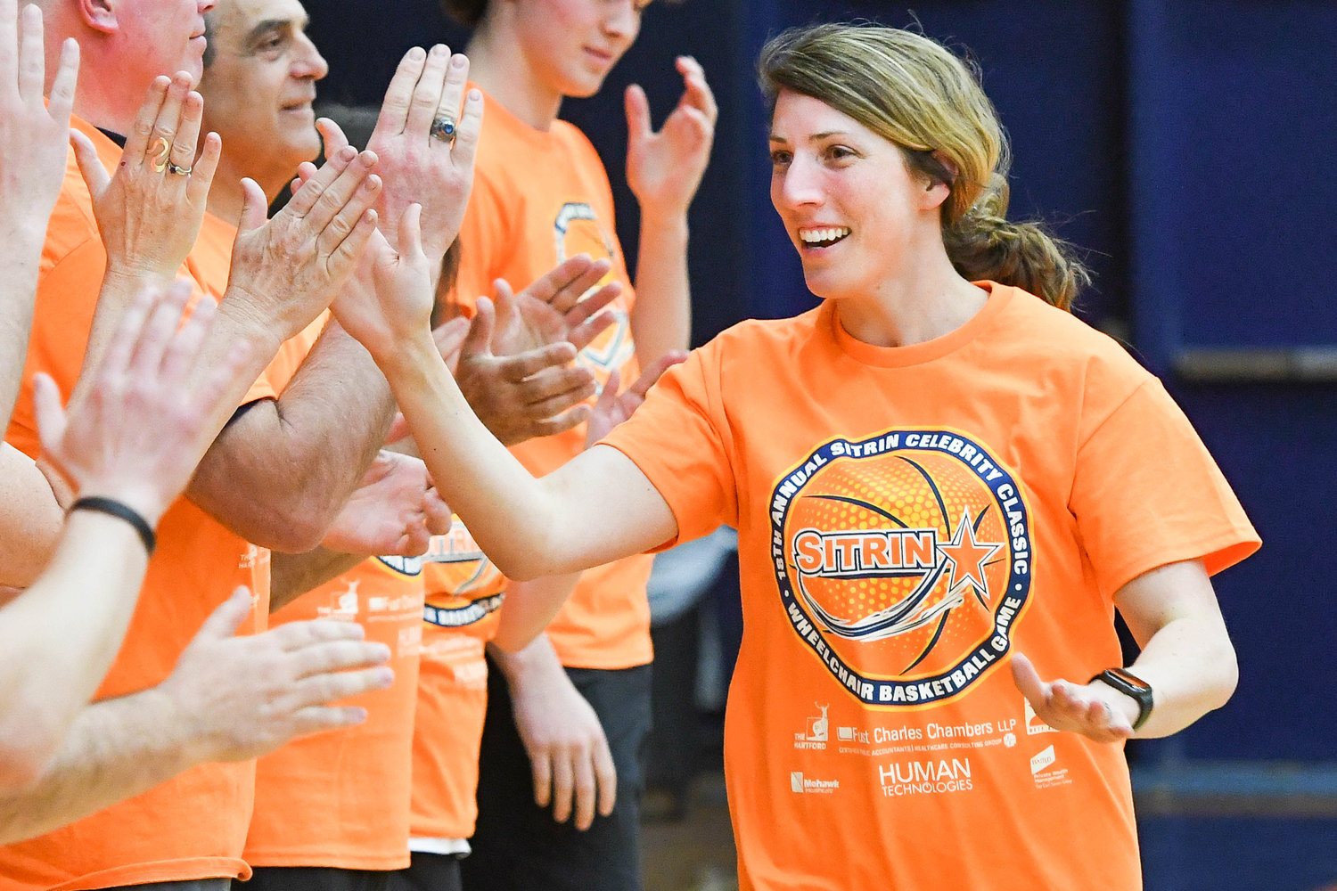 GETTING INTRODUCED — Four-time Olympian Erin Hamlin, of Remsen, is announced to the court before the 18th annual Sitrin Celebrity Wheelchair Basketball Game on Thursday night at Utica University.