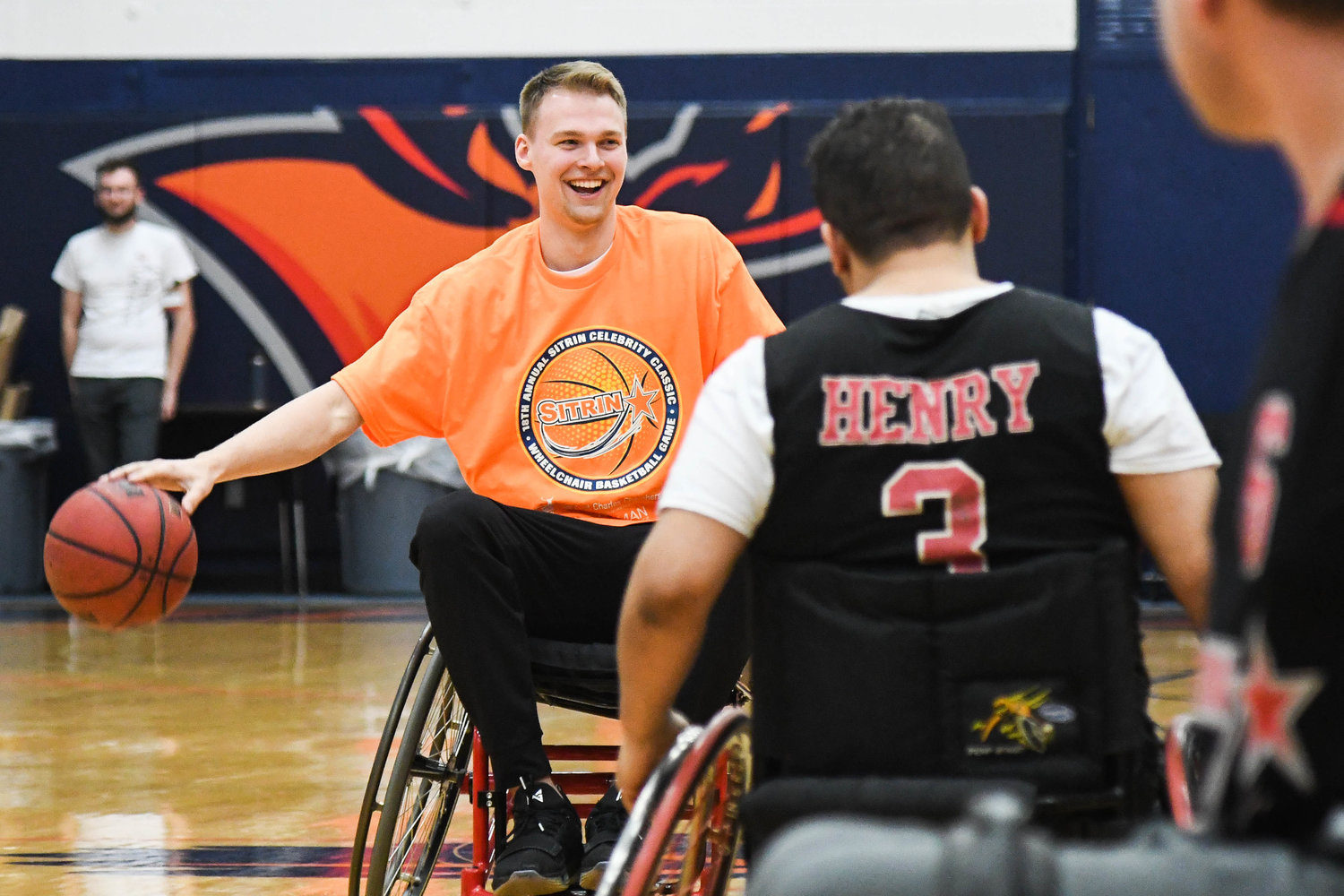 DRIBBLING THE BALL — Syracuse Orange player Buddy Boeheim dribbles the ball during the 18th annual Sitrin Celebrity Wheelchair Basketball Game on Thursday night at Utica University.