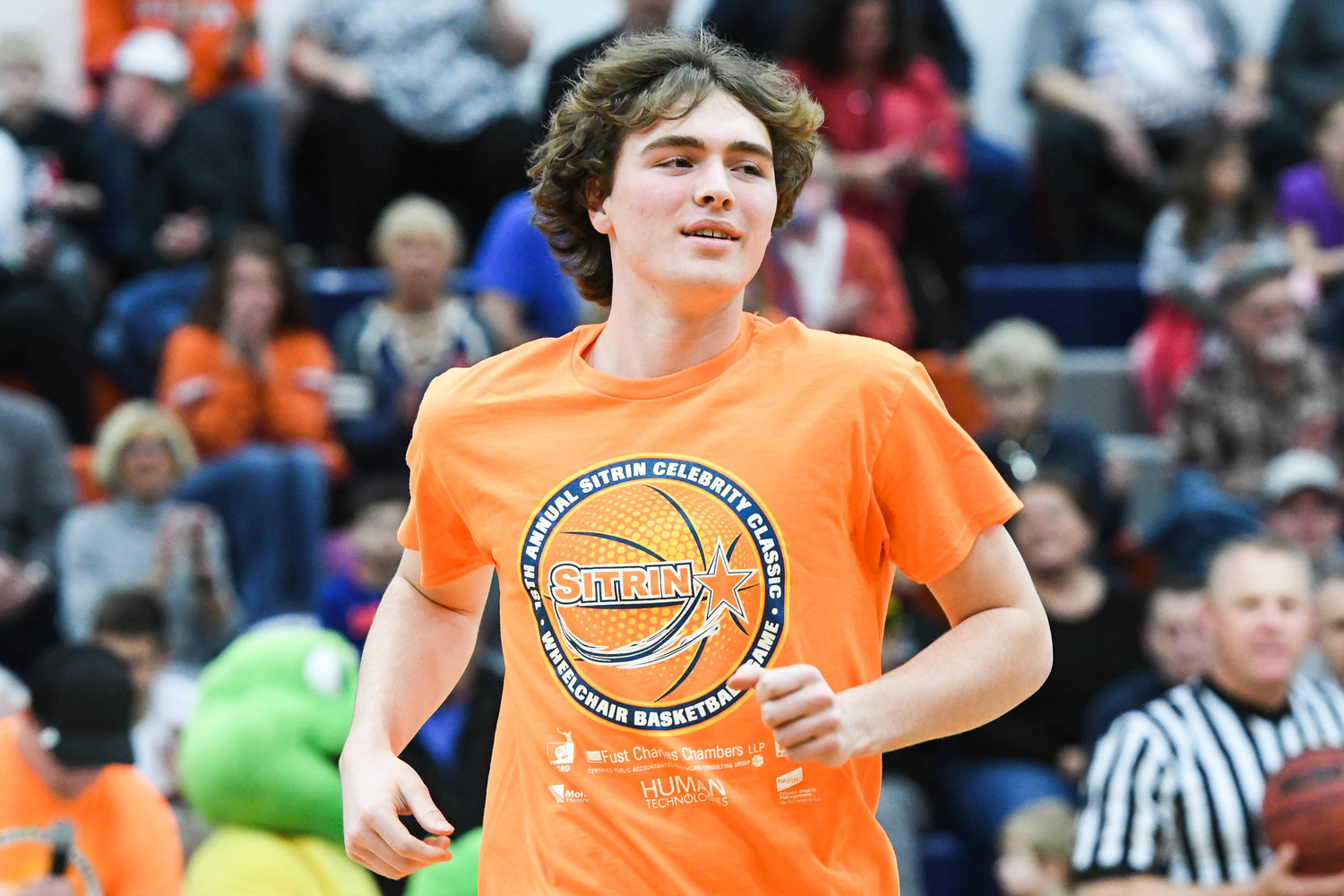 New Hartford senior basketball player Zach Philipkoski is announced to the court during the 18th annual Sitrin Celebrity Wheelchair Basketball Game on Thursday night at Utica University.