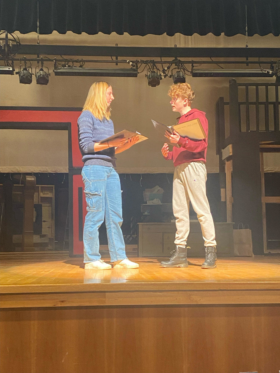 Camden students Madison Bird, left, and Cael Sullivan, rehearse their lines as Emma and Patrick Miles as part of the Camden Drama Club’s production of Stars Hide Your Fires. Sullivan wrote, stars in and directs the production.  The play will be presented at 7 p.m. on both Friday and Saturday, May 6-7, at the Camden High School, 55 Oswego St.