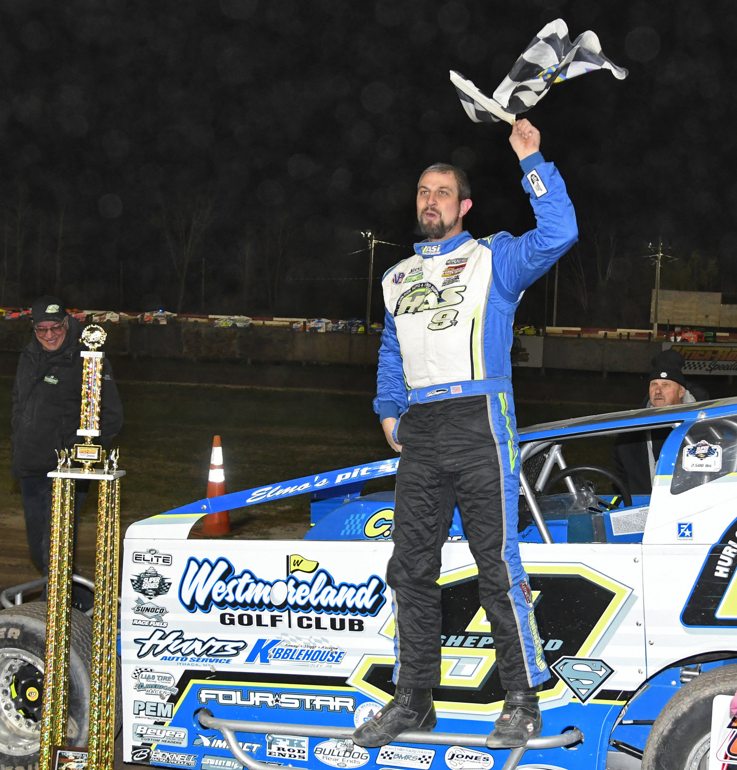 Matt Sheppard, of Savannah, N.Y., celebrates his win at Utica-Rome Speedway in Vernon Friday night after winning the 30-lap “Honoring Alex” $6,800-to-win modified race.