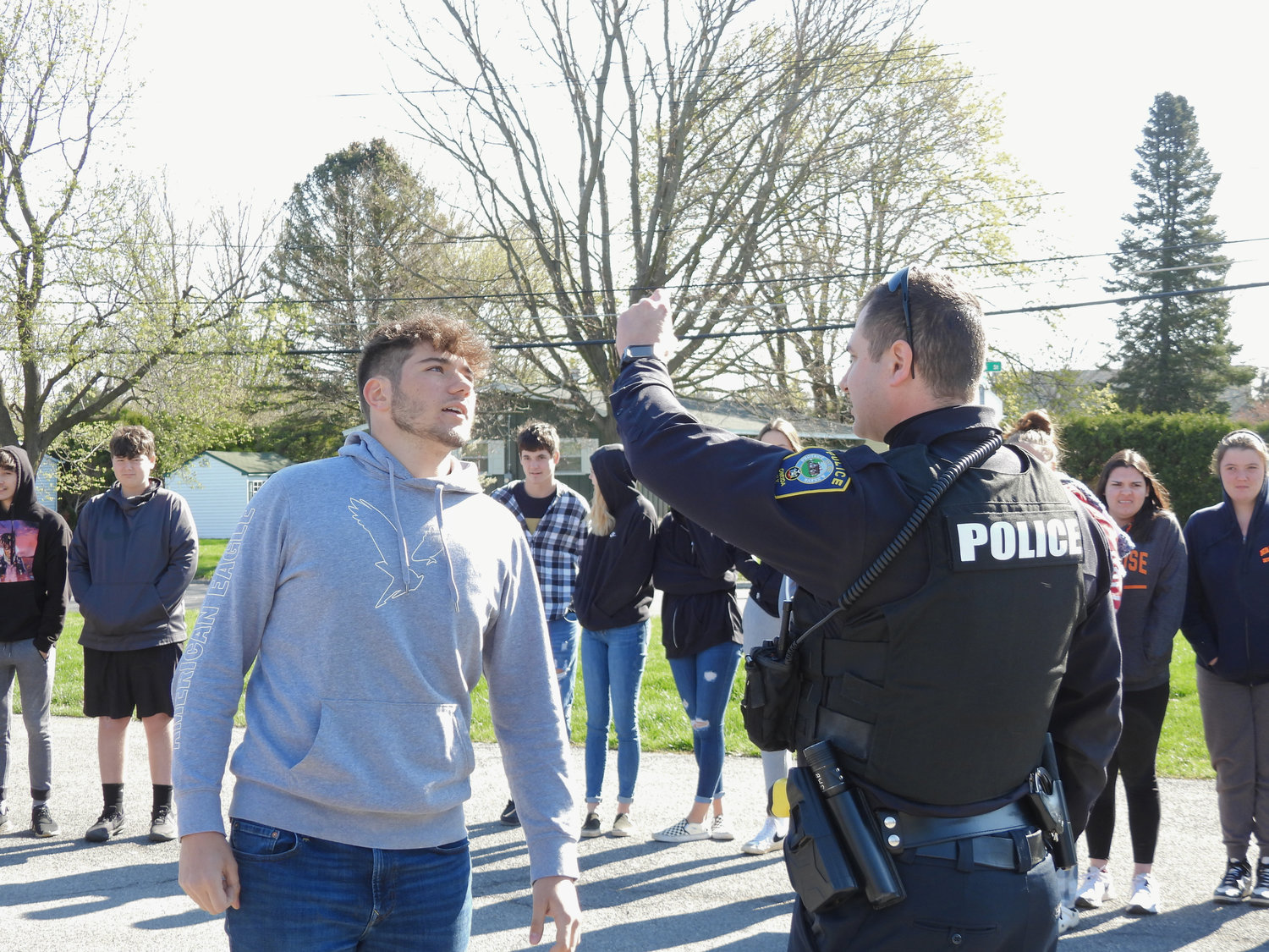 An officer with the Oneida Police Department gives Oneida senior Trajen Masner a sobriety test as part of the Mock DWI