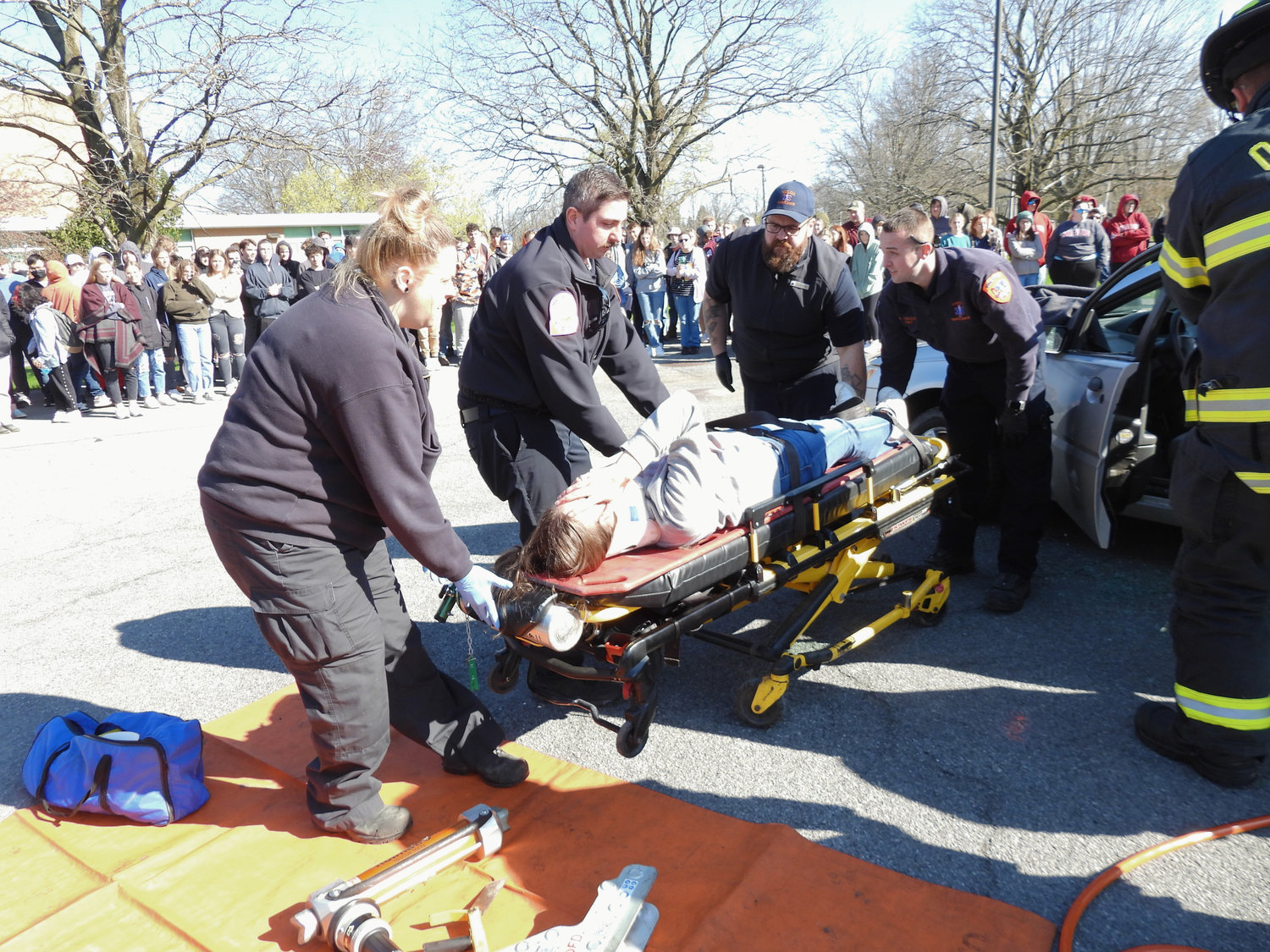 Oneida High School seniors from the Drama Club take the role of victims of a drunk driver at the school's Mock DWI on Thursday