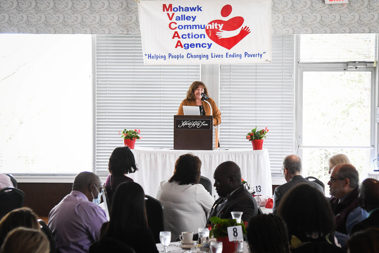 COMMUNITY CHAMPIONS — Karin Piseck speaks as Mohawk Valley Community Action Agency, Inc. honored the 2022 Community Champions at its annual luncheon on Thursday at Hart’s Hill Inn, in Whitesboro. The featured award recipients included: Susan Woods, the Treva Wood Community Activist Award recipient; Carol & Larry Russell, winners of the Community Visionary Award; Stone Ridge Residences, winner of the Community Builder Award; and Utica DEI Community Partnership, winner of the Community Ambassador Award.