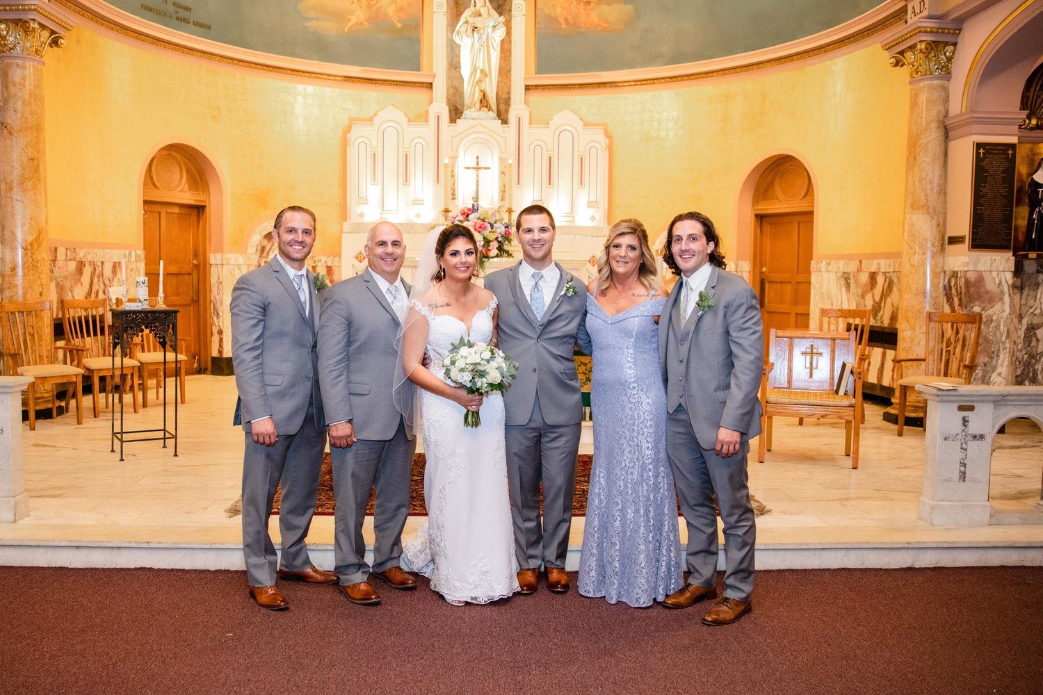 From left: Nick Calenzo, Bob Calenzo, Sarah Schirripa (Calenzo), AJ Schirripa, Jerriann Calenzo, Anthony Calenzo at St. Mary of Mount Carmel Church in Utica.