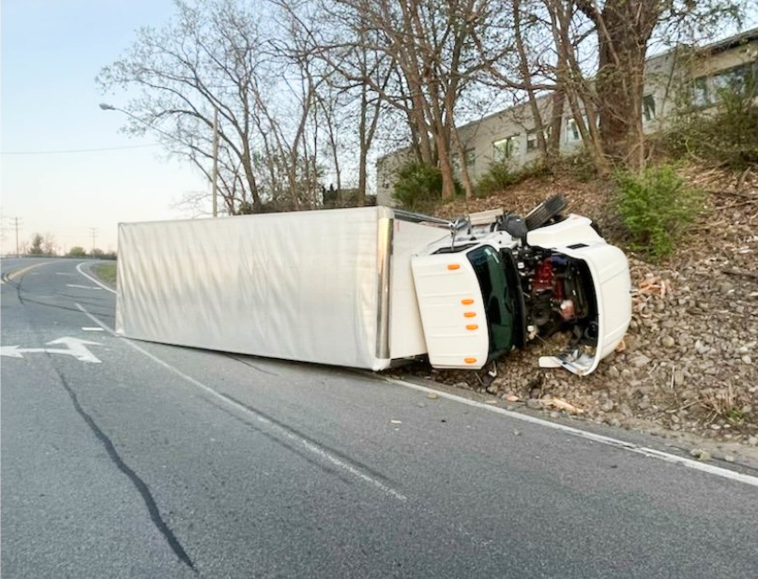 This box truck rolled onto its side, and its driver was hospitalized, after crashing into the side of a car on Route 5S in German Flatts in Herkimer County Tuesday evening, according to the New York State Police.