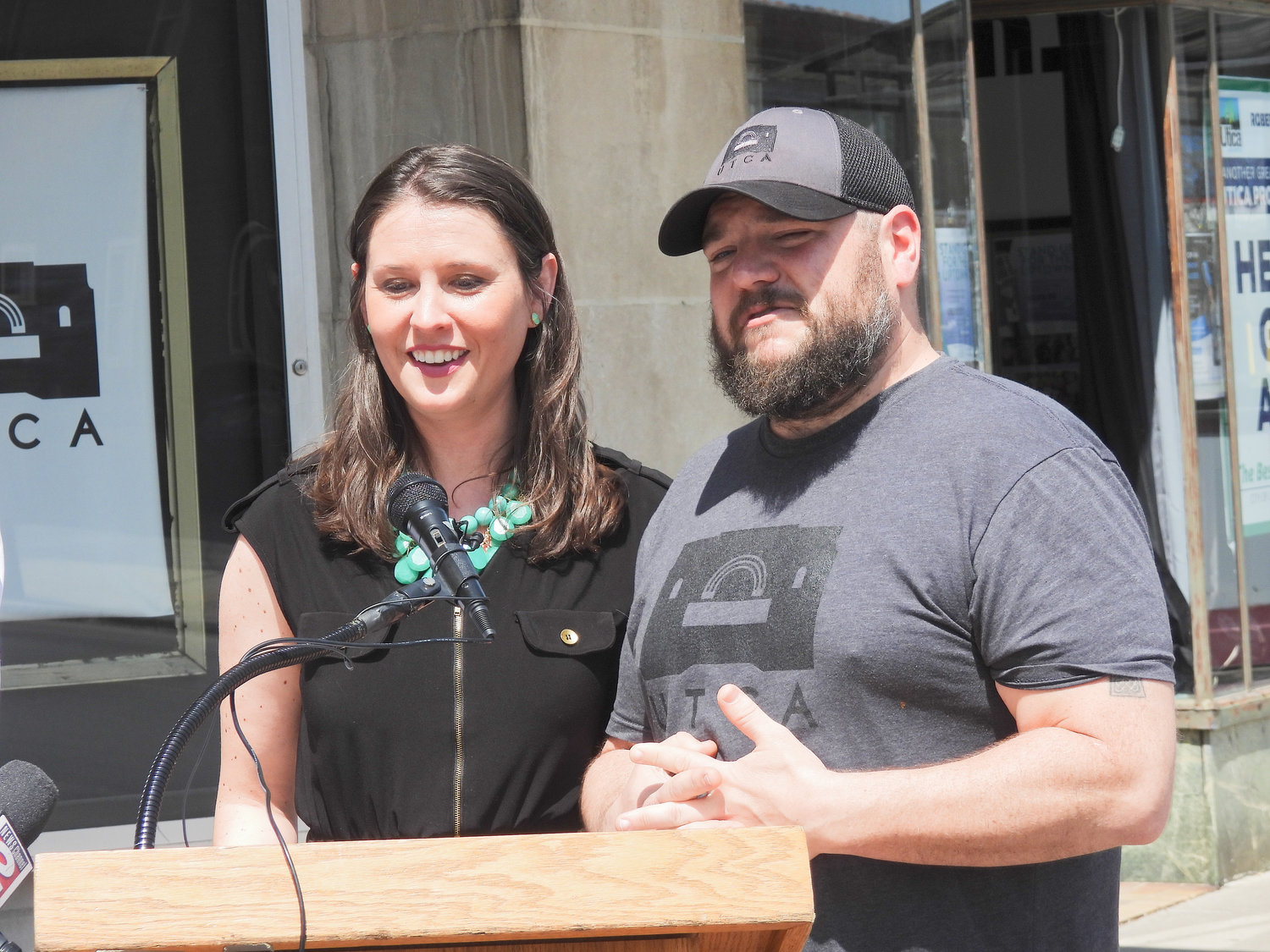 Briana and Devin Mahoney speak at a press conference on Thursday, thanking the city for the investment and those who have participated in fundraising efforts to repair the Uptown Theatre for Creative Arts's roof.