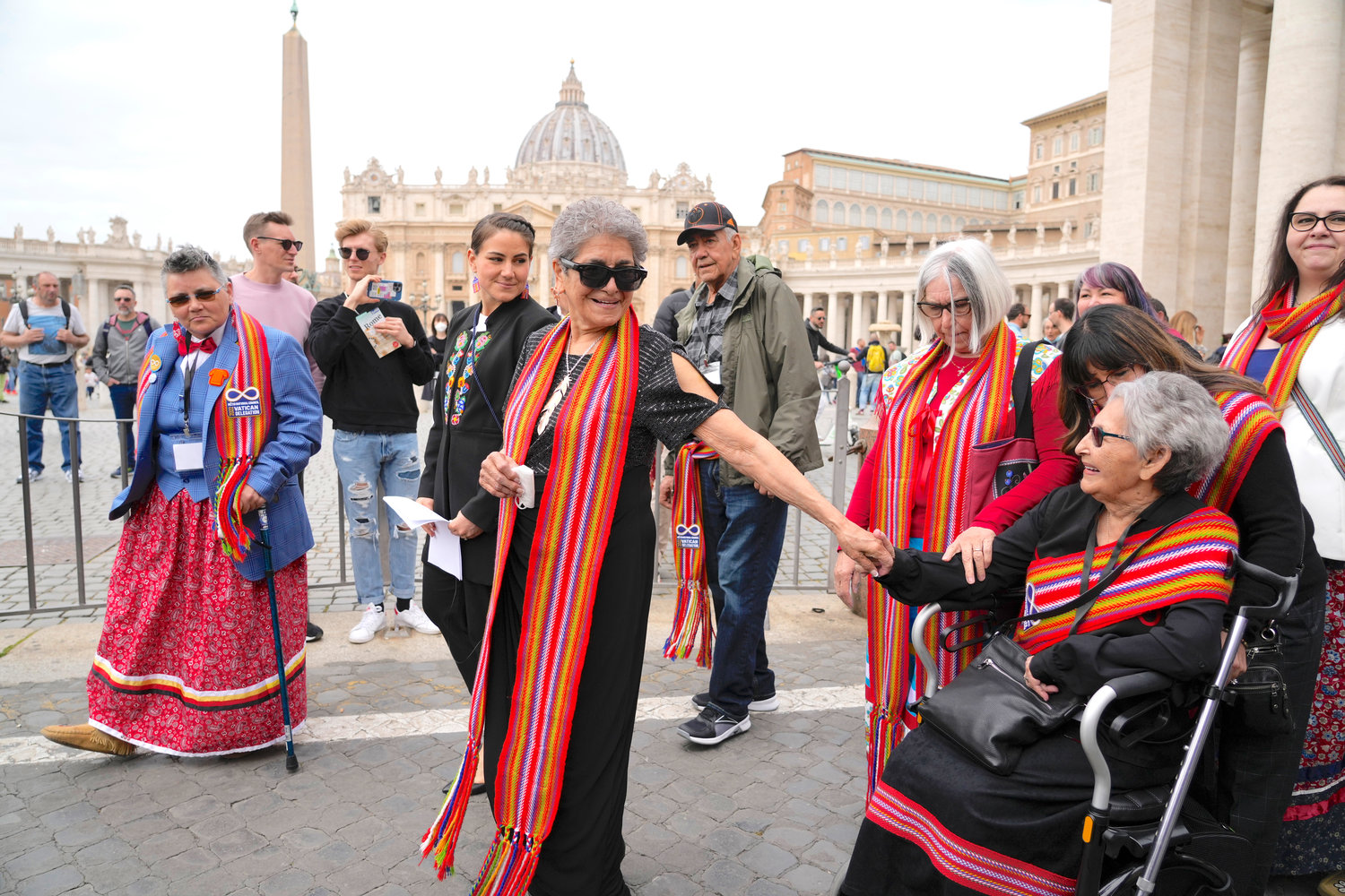 President of the Metis community, Cassidy Caron, at center in black outfit, and other delegates arrive to speak to the media in St. Peter’s Square after their meeting with Pope Francis at The Vatican, Monday, March 28. Pope Francis is going ahead with his plan to visit Canada this summer so he can apologize in person for abuse suffered by Indigenous peoples at the hands of the Catholic church.