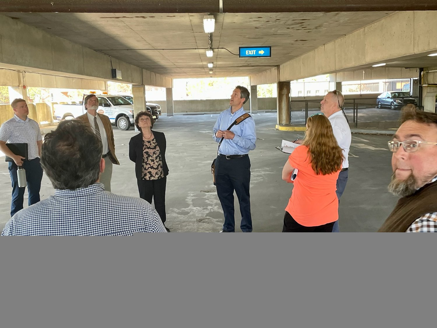 Engineer Christopher N. Latreille, middle, shows Rome councilors and city officials the condition of the ceiling at the Liberty James Garage during a walk-through and special presentation by Bergmann Architects, Engineers, Planners Wednesday.