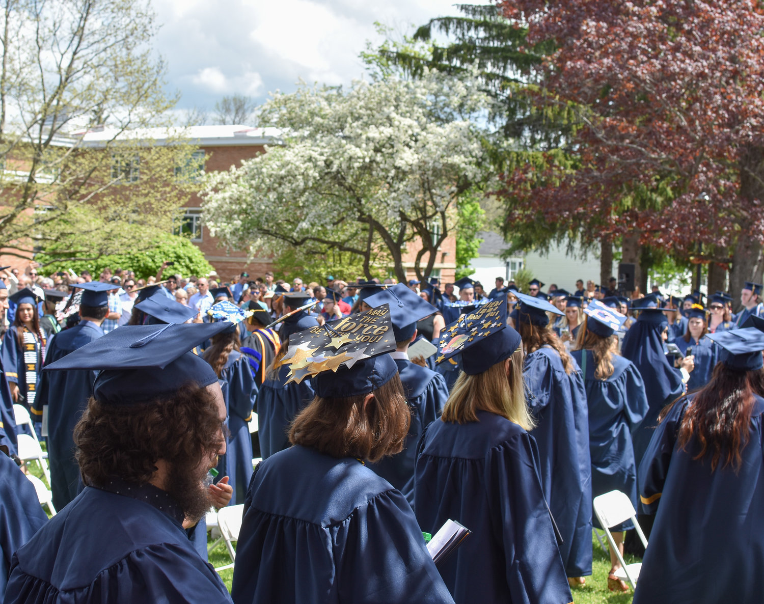 Trees on campus were in full bloom as part of the graduates' special day.