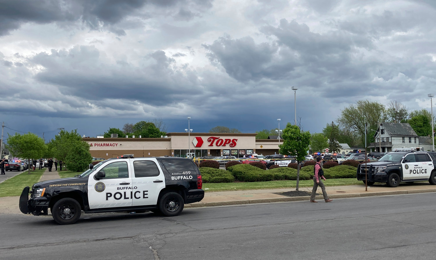 Buffalo Police respond to a shooting at Tops Friendly Market in Buffalo on Saturday.