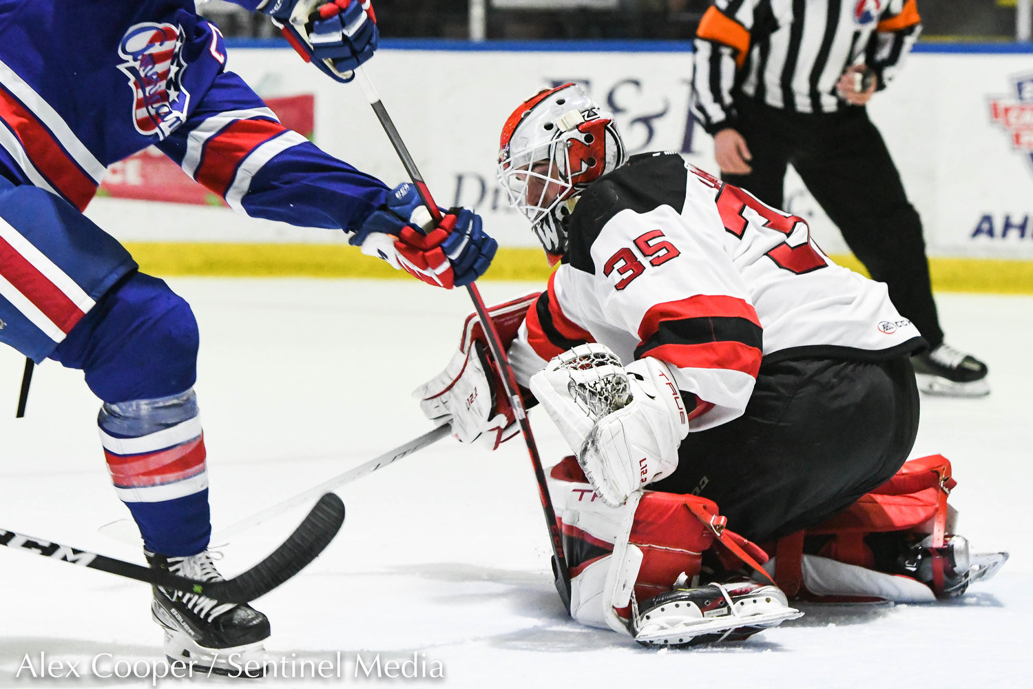 Comets goalie Nico Daws blocks a shot during the playoff game against Rochester on Saturday.