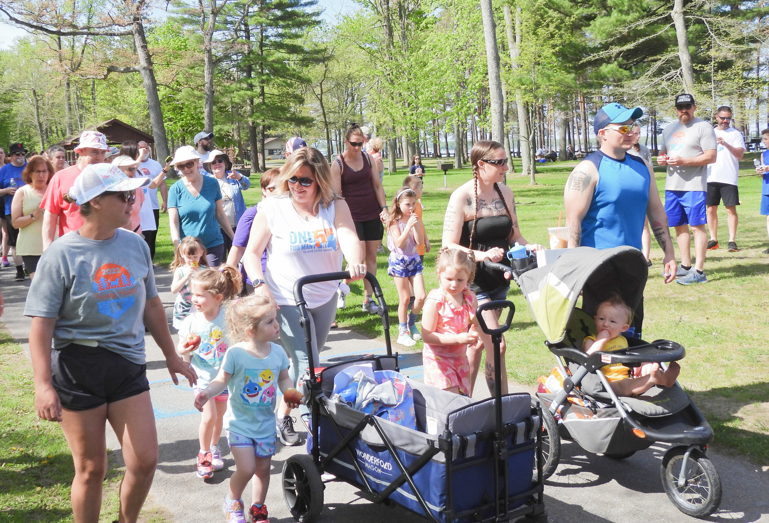 FAMILY FUN — Local residents enjoy a day of fun and sun at Verona Beach State Park for the Husky Hustle 5k Fun Run and Walk, raising money for the North Broad Elementary PTO to help students.