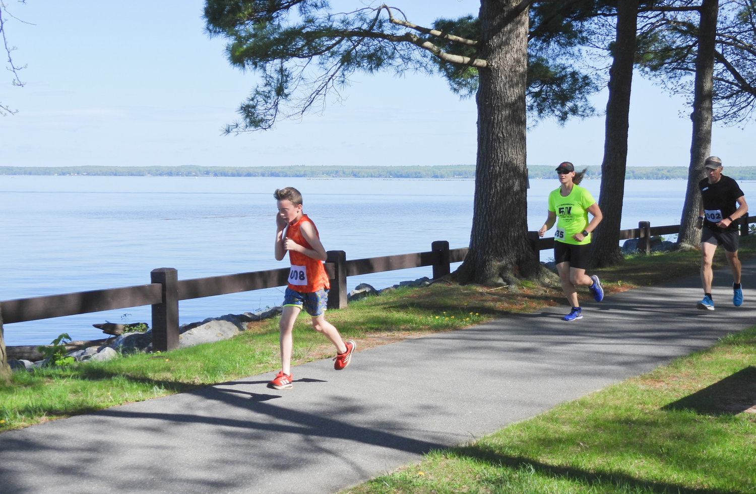 MAKING WAVES — 10-year-old Liam Flint, a fourth-grader at North Broad Elementary maintains his place near the front of the pack for the Husky Hustle 5k Fun Run and Walk at Verona Beach State Park.