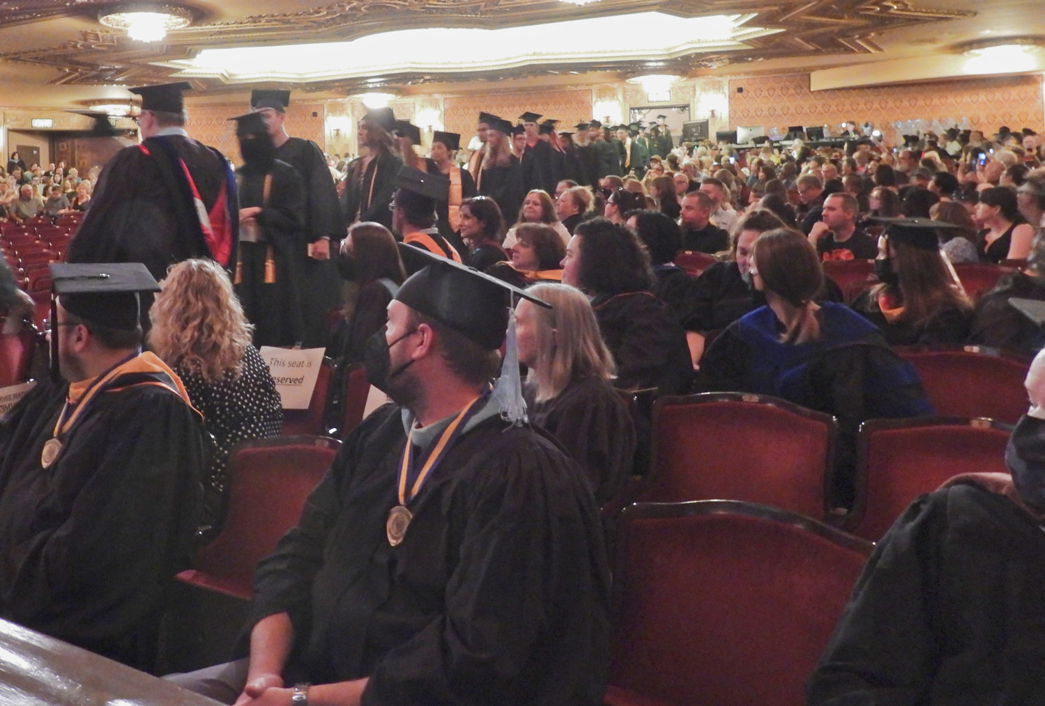 Mohawk Valley Community College graduates walk down the aisle of the Stanley Theater, ready to receive their diplomas and begin the next chapter of their life.