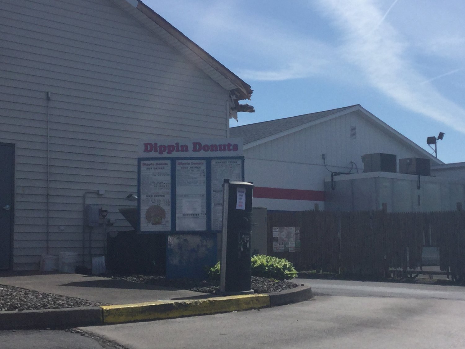 DIPPIN DONUTS DAMAGED — A delivery truck clipped the corner of Dippin Donuts on Erie Boulevard West shortly after 10 a.m. Wednesday. No one is believed to have been injured and business continued. The Rome Police Department is investigating.