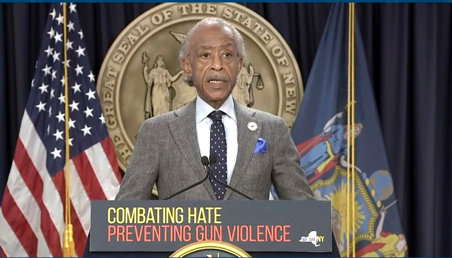 In this image taken from video, Rev. Al Sharpton speaks during a news conference by Gov. Kathy Hochul, Wednesday, May 18, 2022, in New York.  New York would require state police to seek court orders to keep guns away from people who might pose a threat to themselves or others under a package of executive orders and gun control bills touted Wednesday by Hochul in the aftermath of a racist attack on a Buffalo supermarket.  (Office of the Governor of New York via AP)